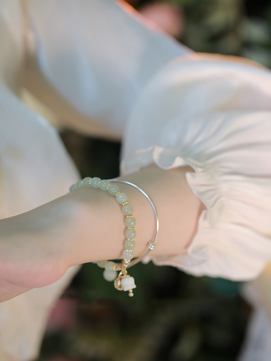 Hetian Jade Golden Bell Pendant Bracelet - Full Strand Luxe