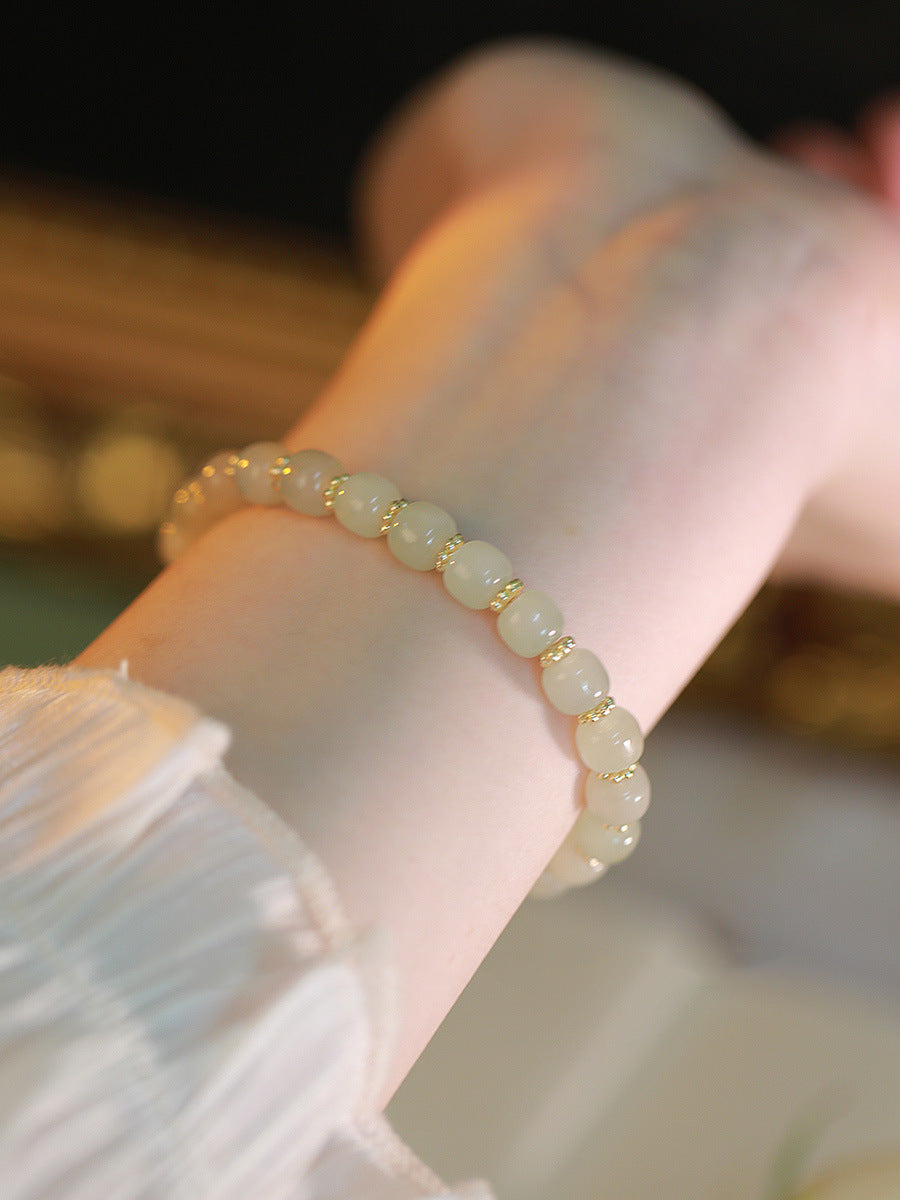 Hetian Jade Golden Bell Pendant Bracelet - Full Strand Luxe